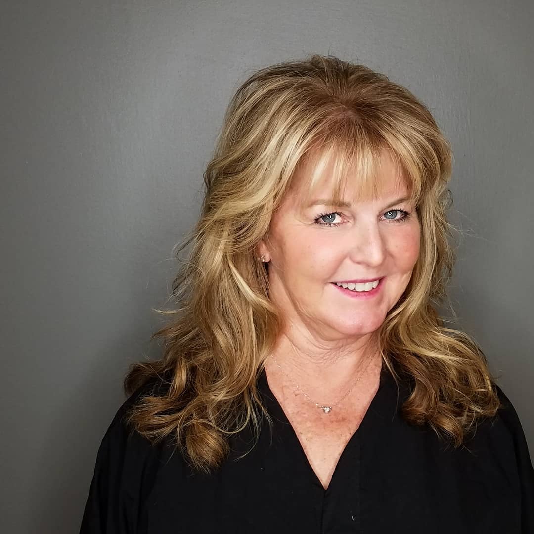 Soft Layered Waves with Face-Framing Bangs