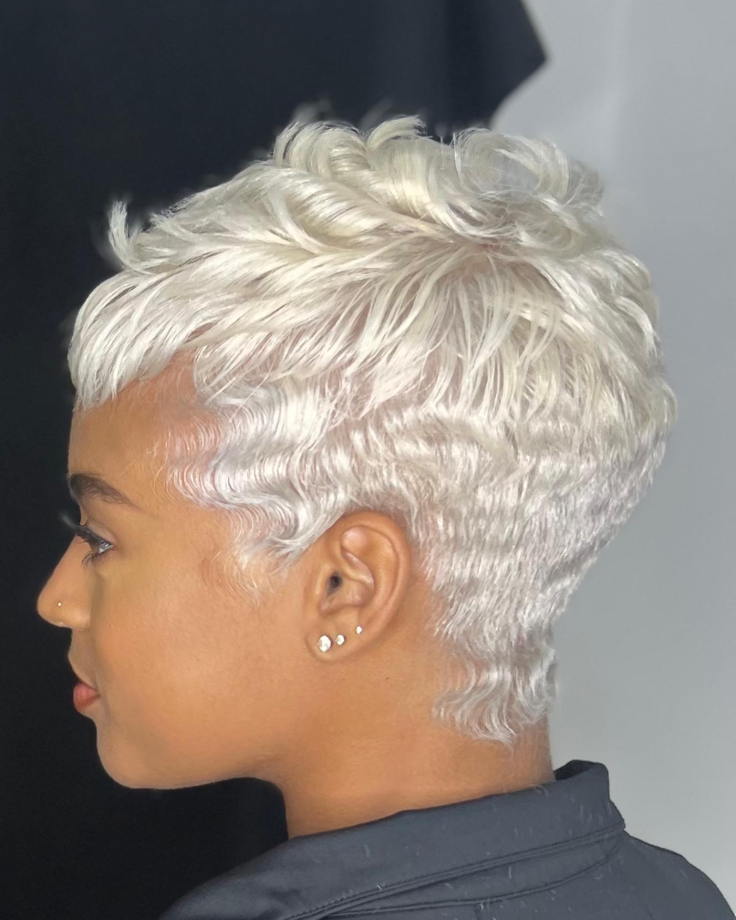 Stylish Short Curly Pixie Cut with Defined Texture