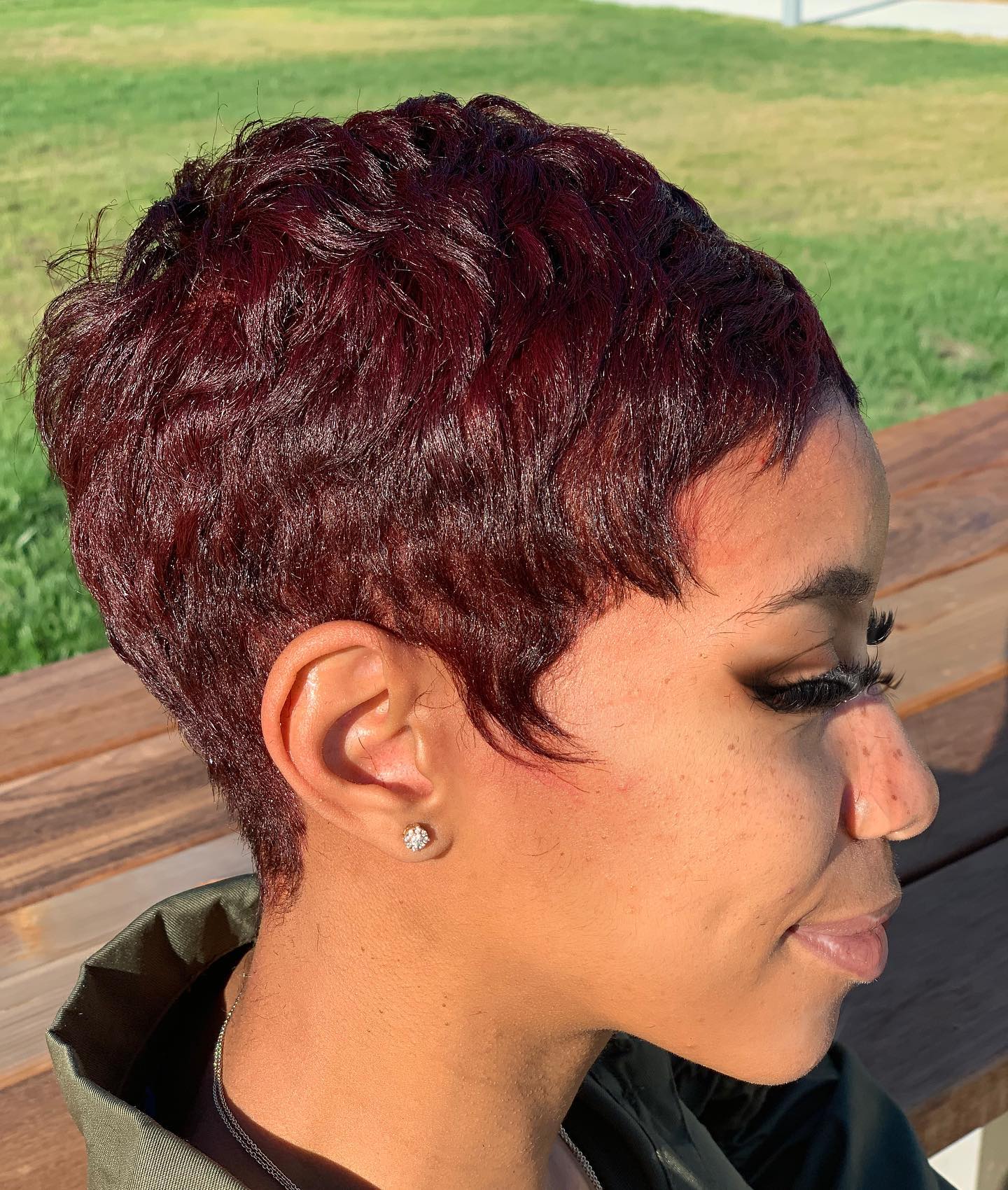 Textured Burgundy Pixie Cut with Defined Curls