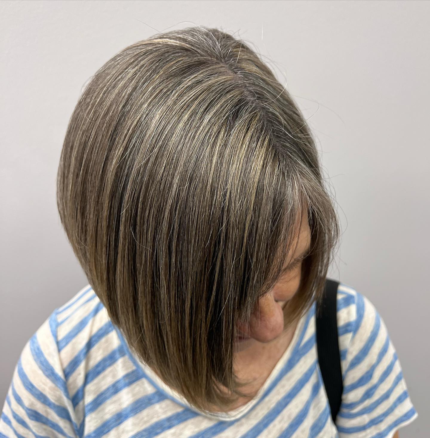 Chic Angled Bob with Subtle Silver Highlights