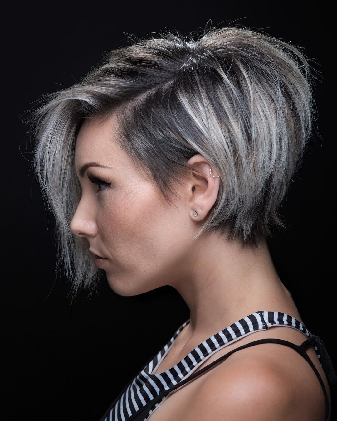 Choppy High-Contrast Pixie Cut with Silver Highlights