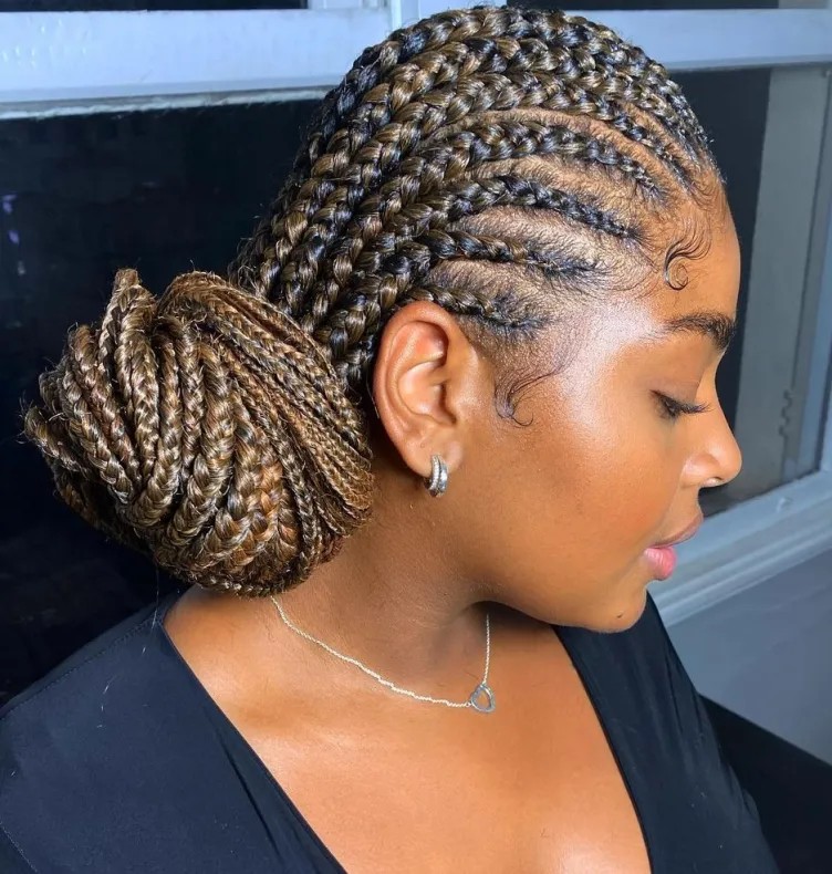 Elegant Twisted Ghana Braids with Decorative Bun