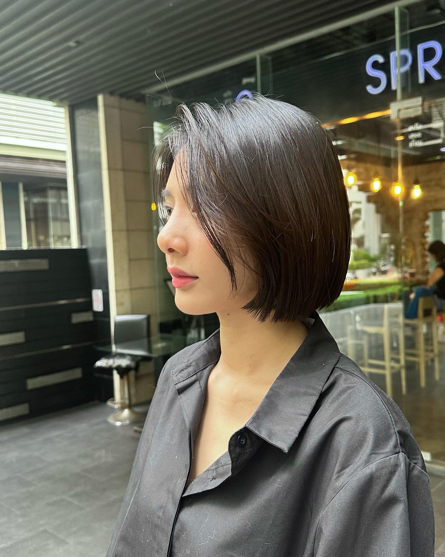 Sleek Textured Bob with Subtle Side-Swept Layers