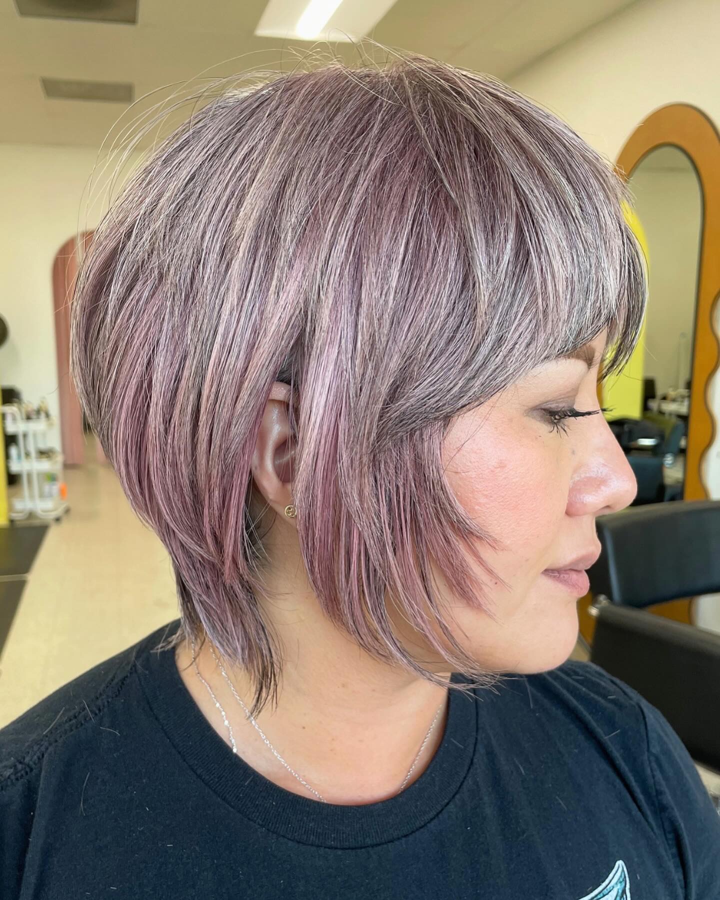 Softly Textured Bixie Cut with Lush Lavender Highlights