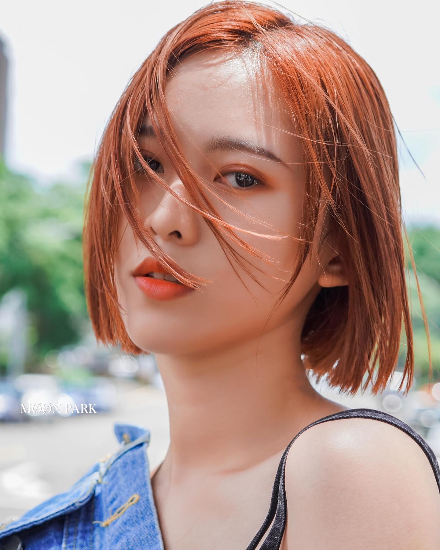 Stylish Copper-Toned Textured Bob with Face-Framing Layers