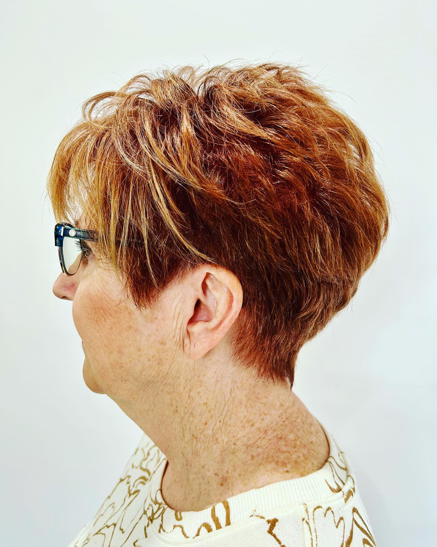 Textured Short Cut with Warm Copper Tones
