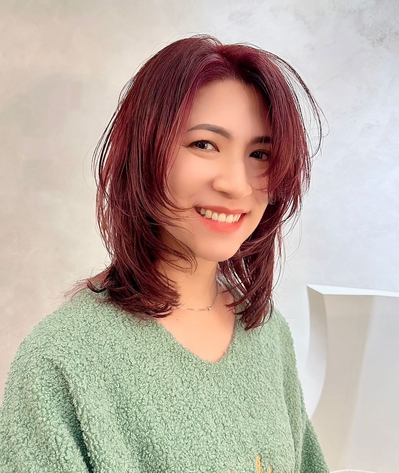 Vibrant Layered Cut with Flattering Face Framing