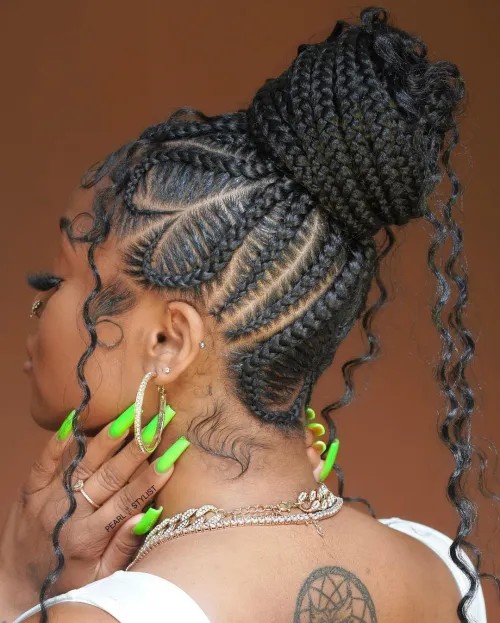elegant braided bun with curly tendrils