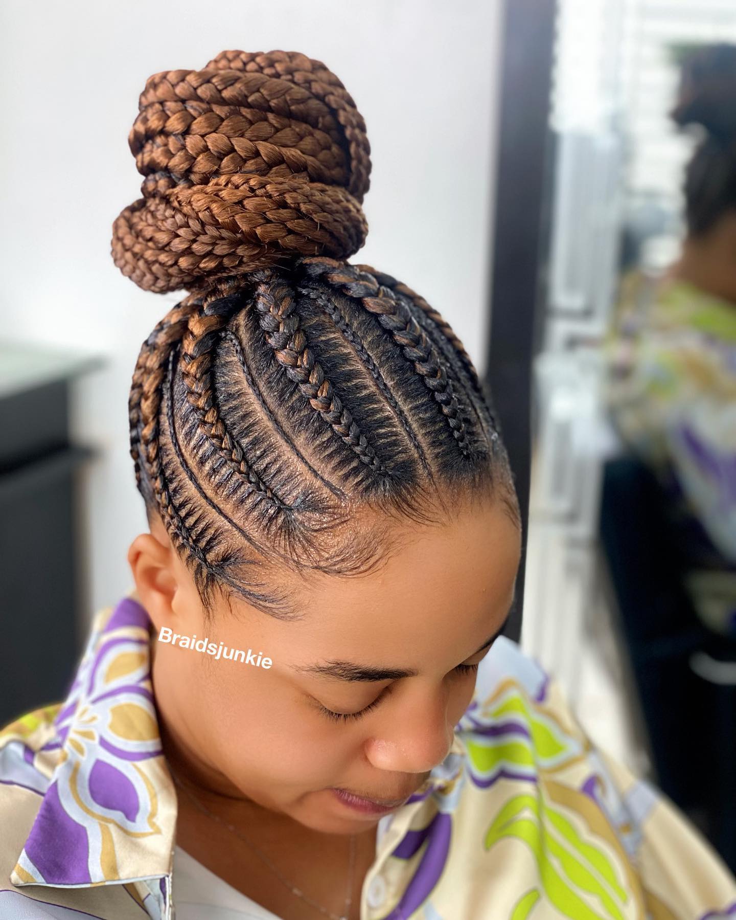 Elegant Braided Bun with Intricate Cornrow Base
