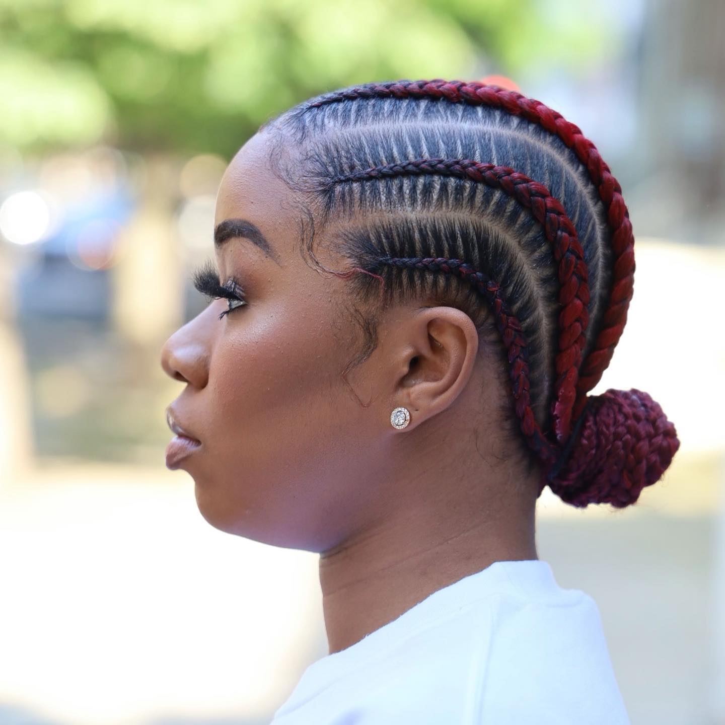 Elegant Braided Bun with Subtle Ombre Accents