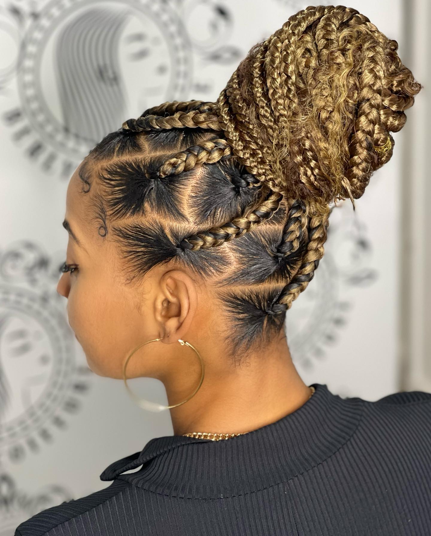 Intricate Braided Bun with Artistic Detailing