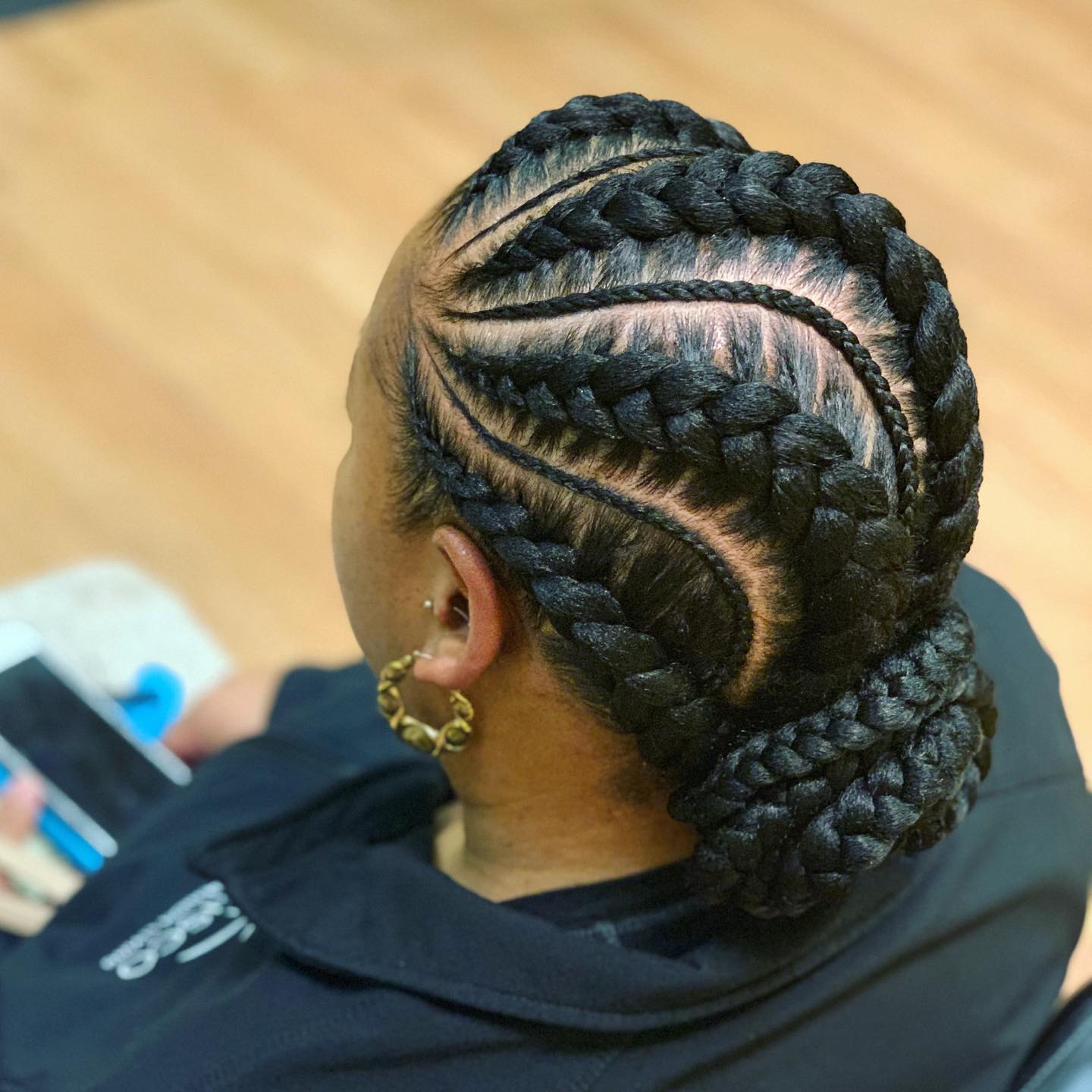Intricate Braided Bun with Defined Patterns