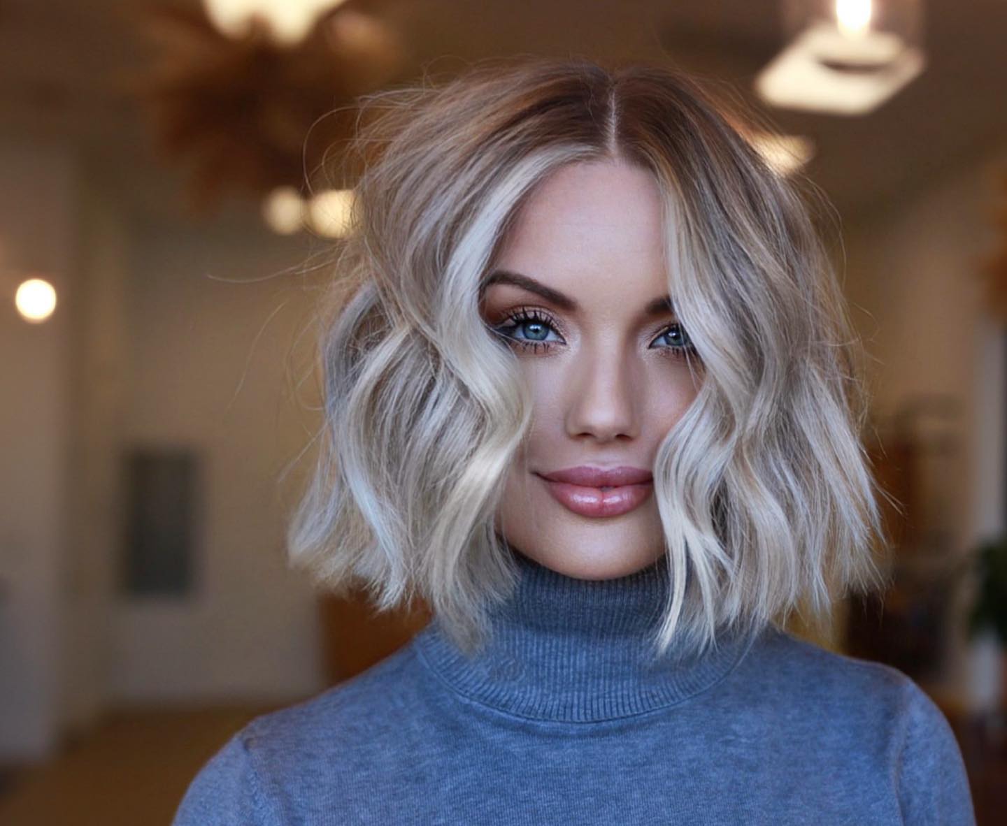 Stylish Face-Framing Middle Part Bob with Beachy Waves