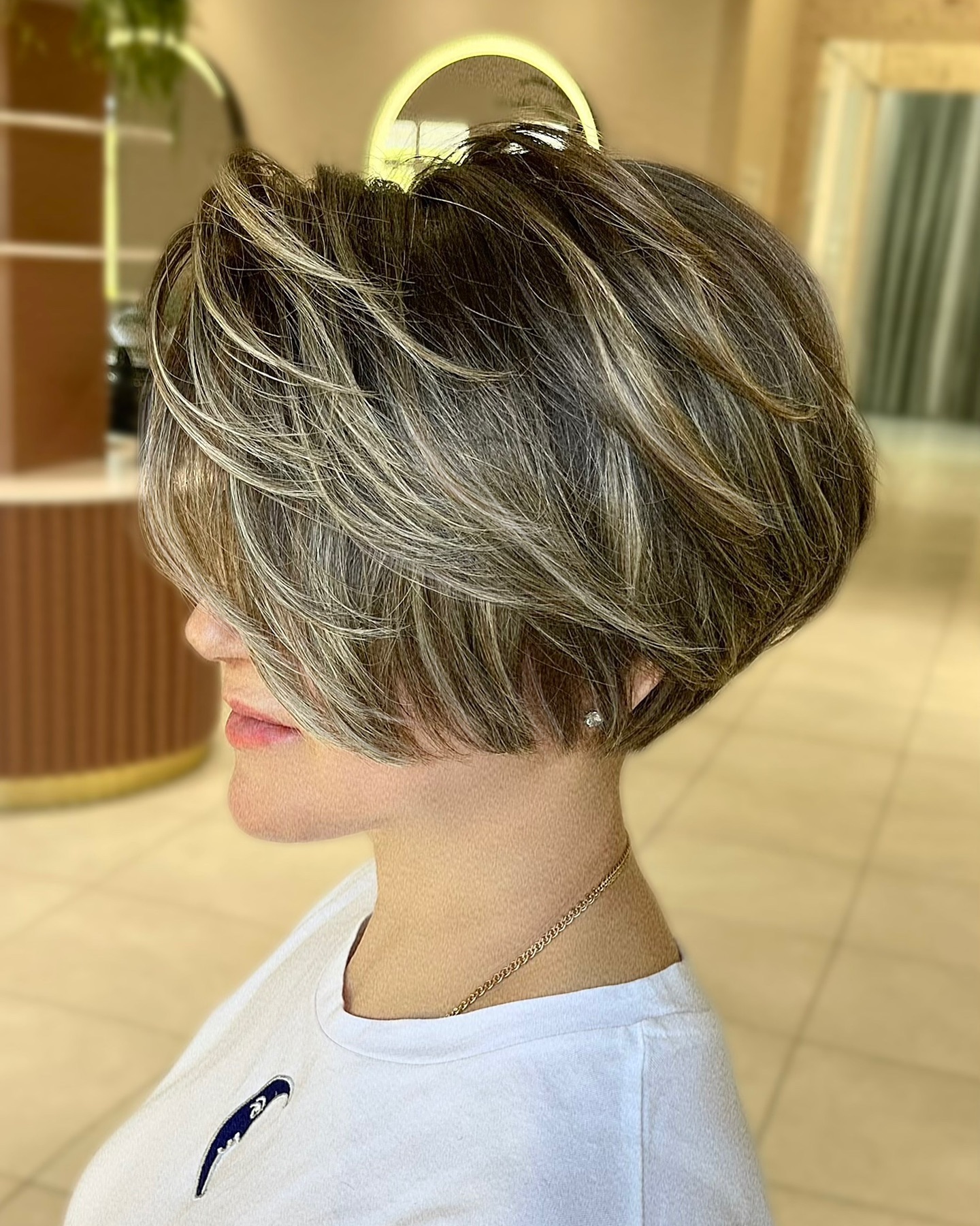 Stylish Feathered Bob with Subtle Highlights