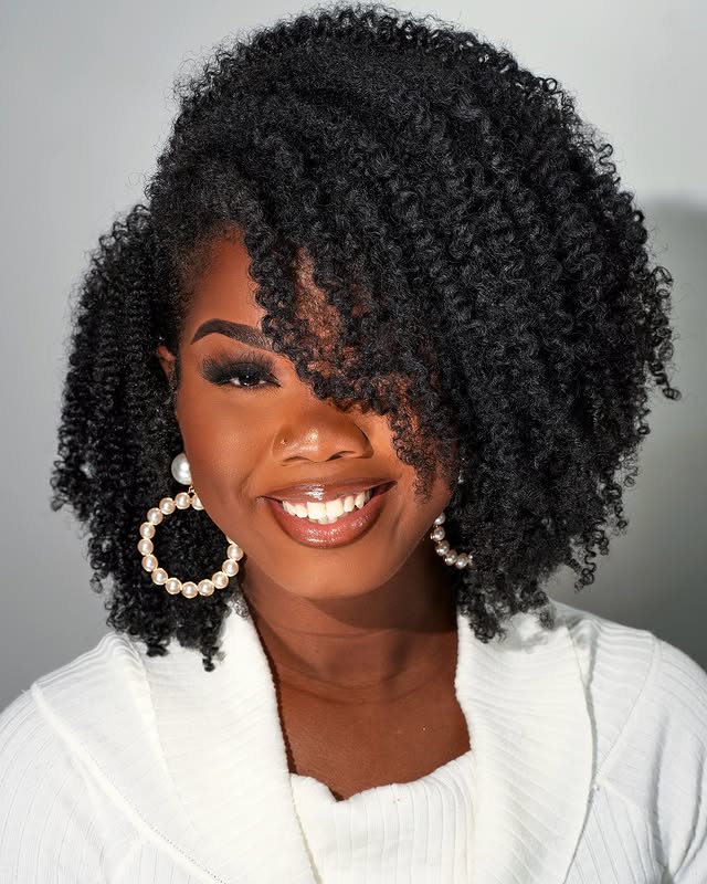 textured curly twist out with side part
