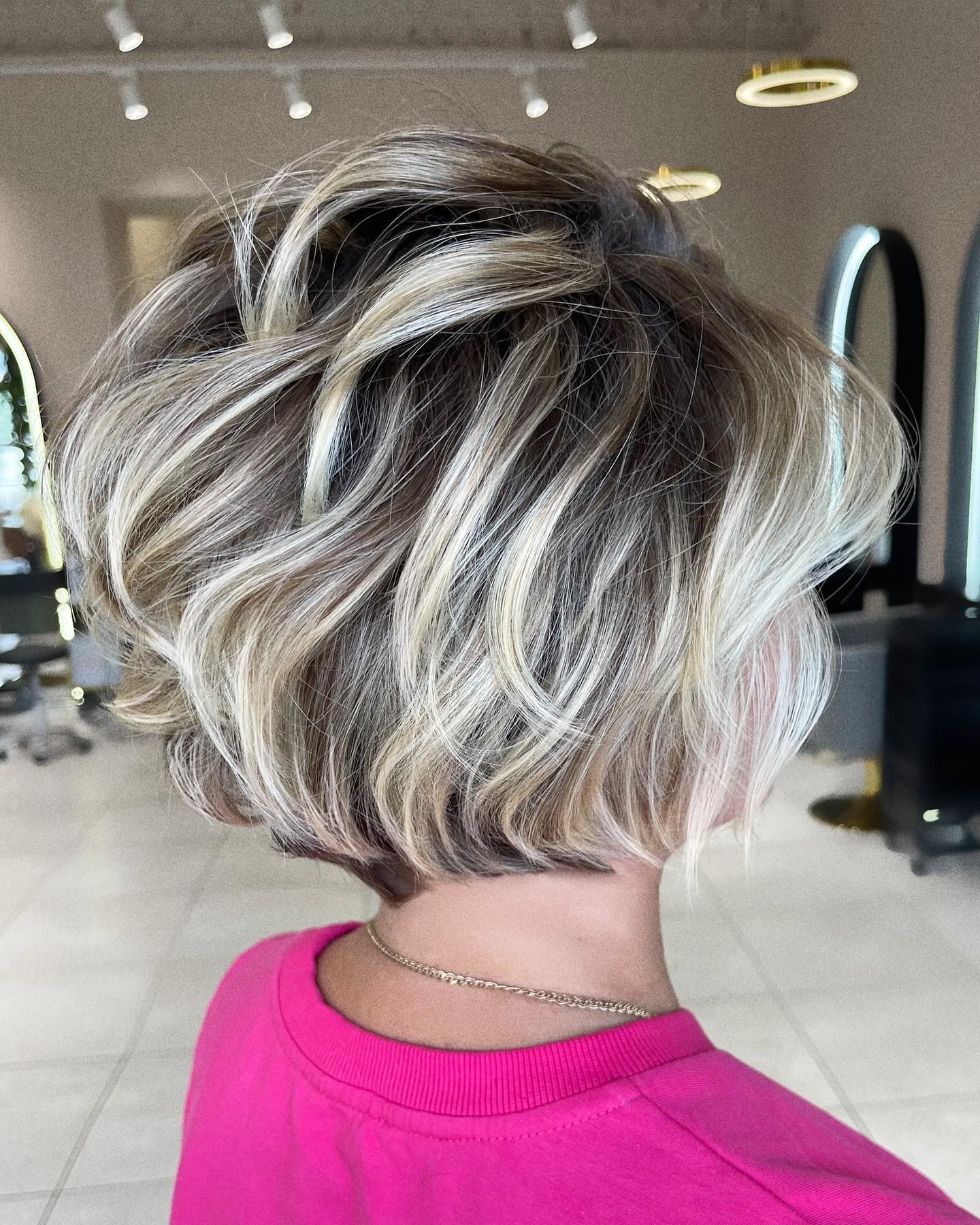 Textured Feathered Bob with Soft Blonde Highlights