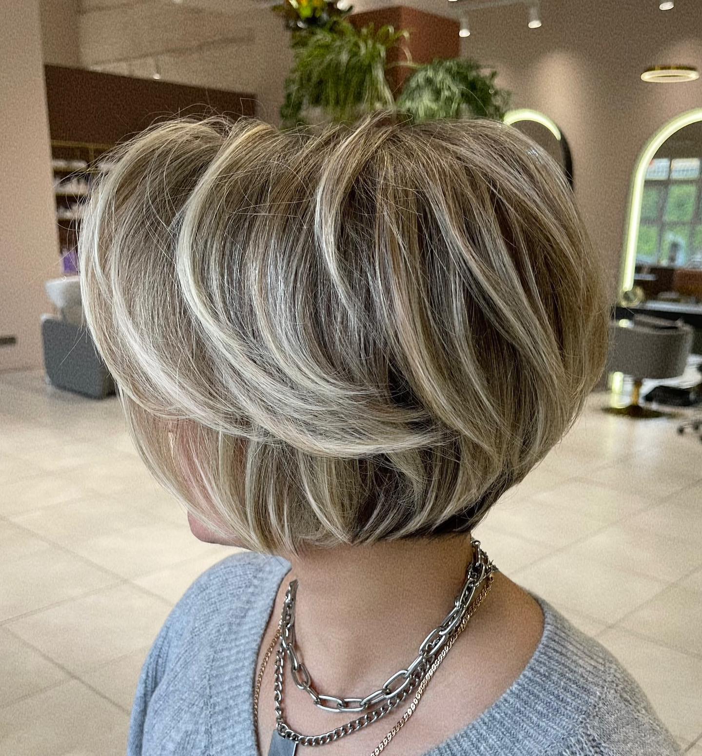 Trendy Feathered Bob with Chic Highlights