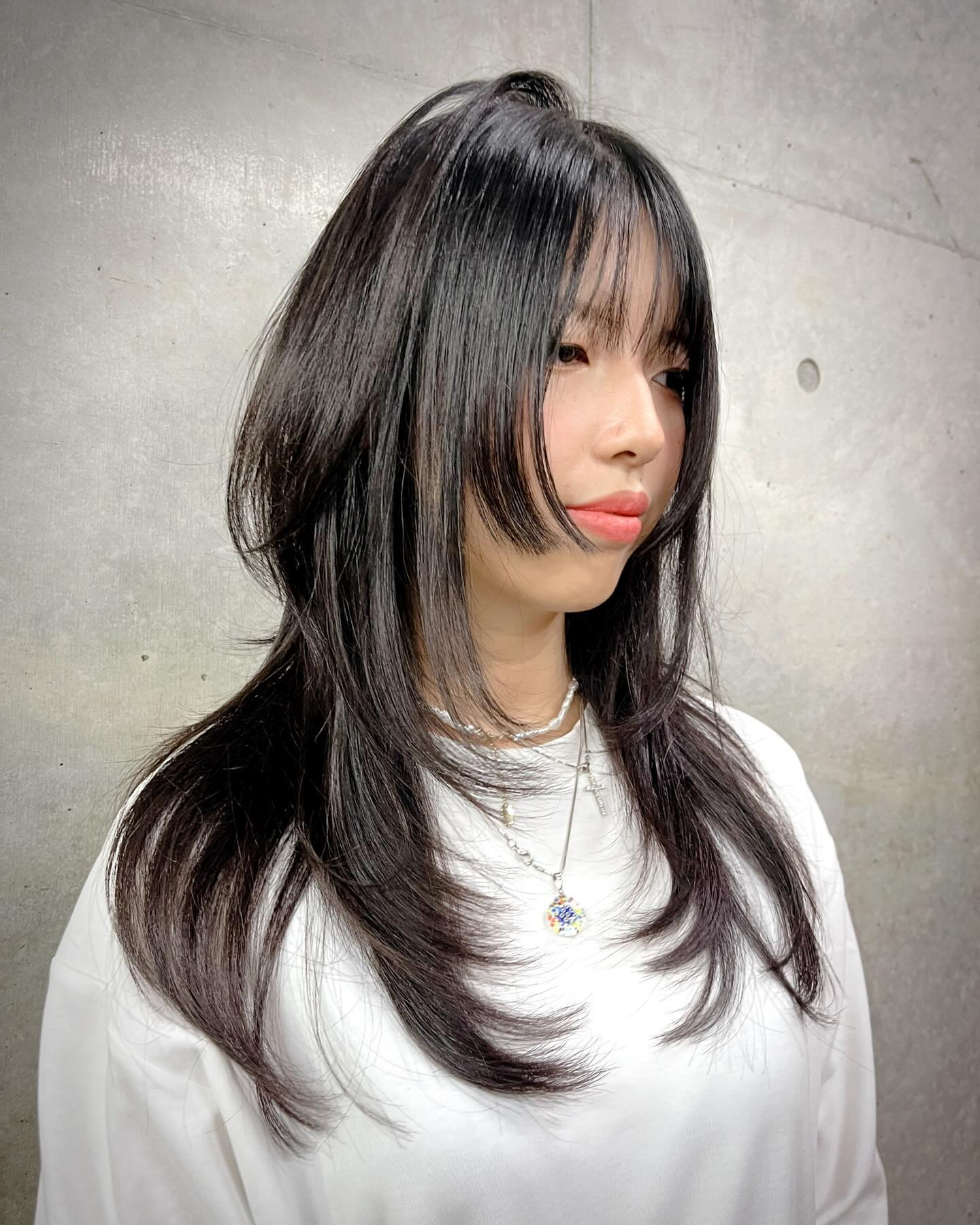 Trendy Long Layers with Face-Framing Soft Bangs