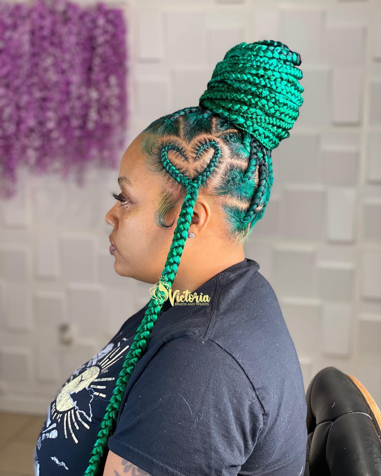 Vibrant Green Braided Bun with Unique Heart Design