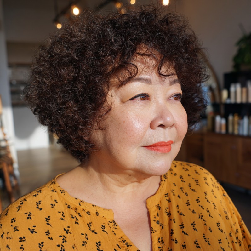 Chic Curly Brunette Bob with Soft Volume