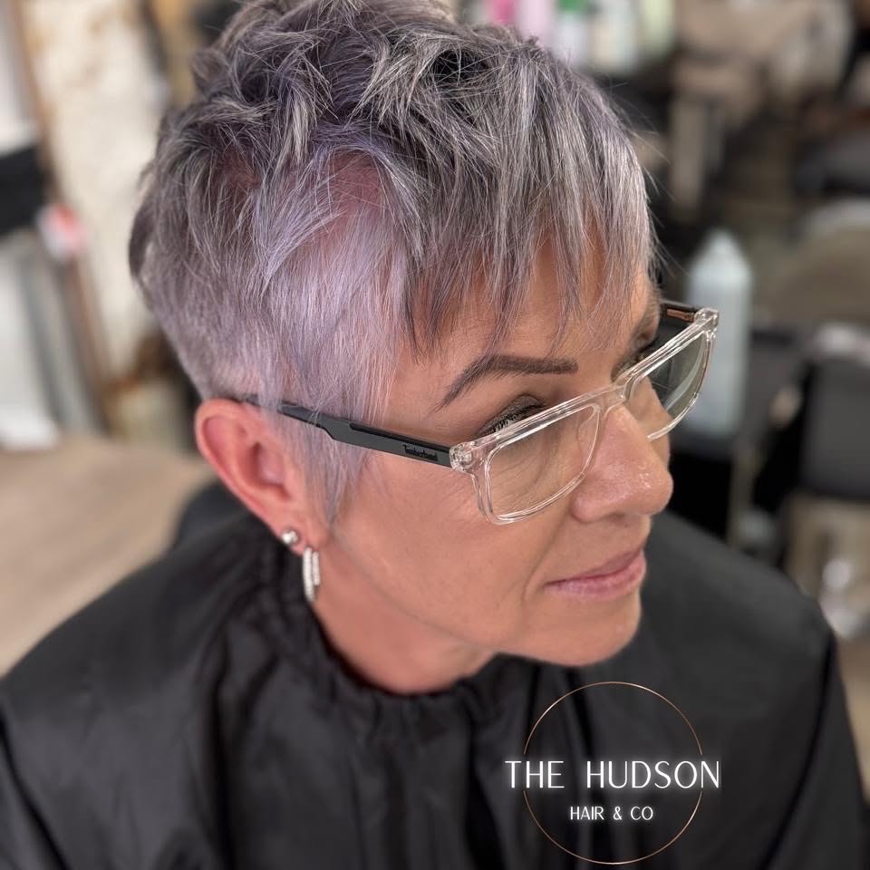 Chic Textured Side-Parted Pixie with Subtle Lavender Tones