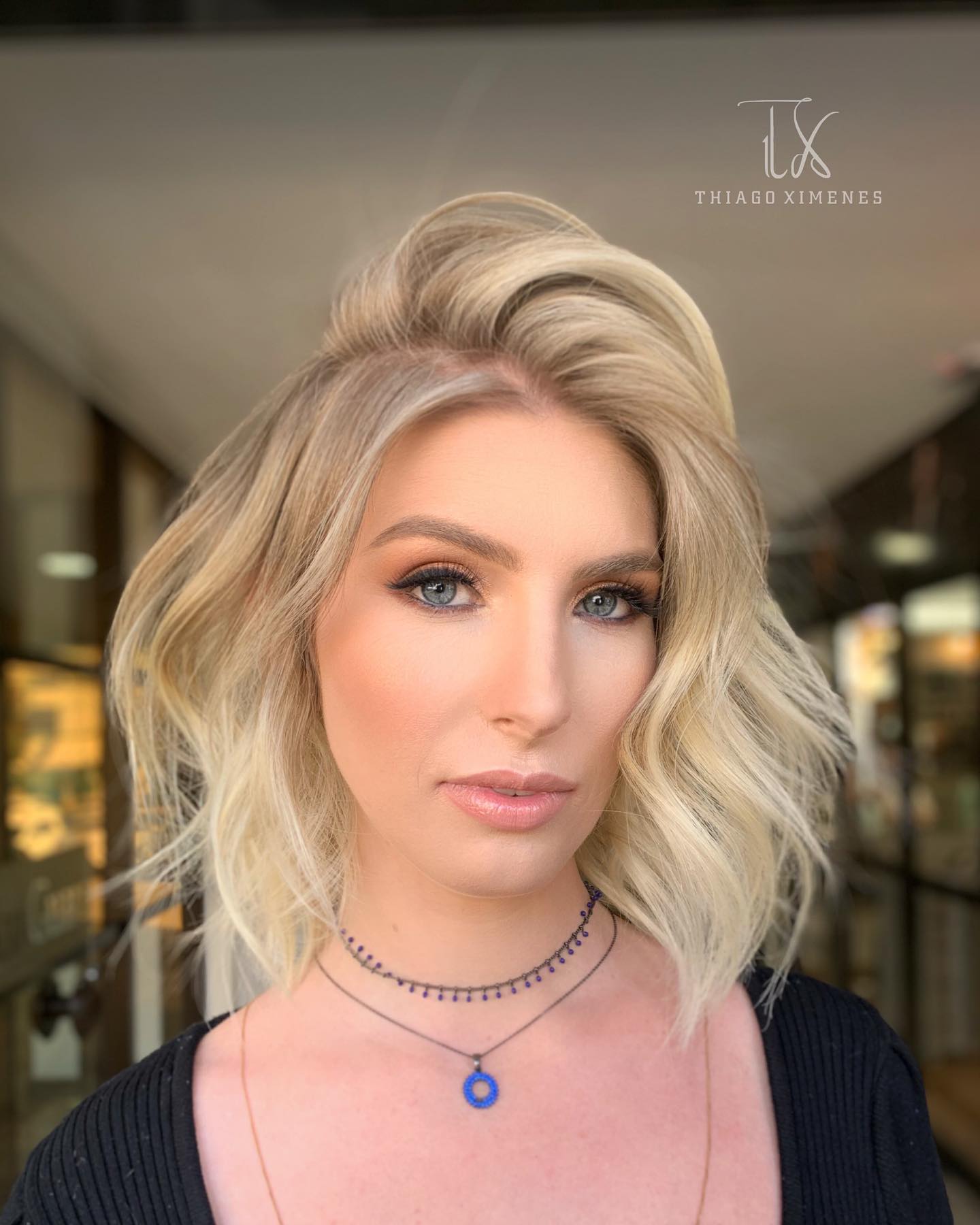 Chic Voluminous Layered Blonde Cut with Lived-In Dimension