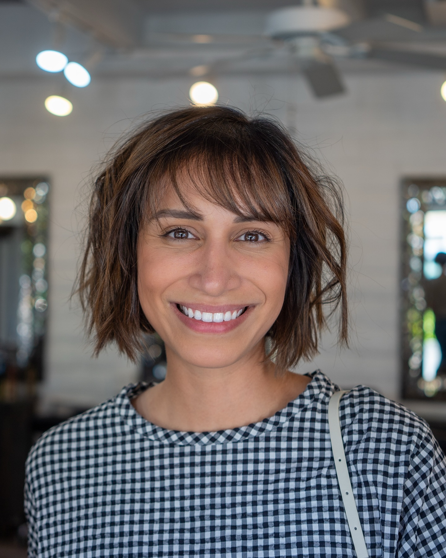 Effortlessly Tousled Frayed Bob with Soft Bangs