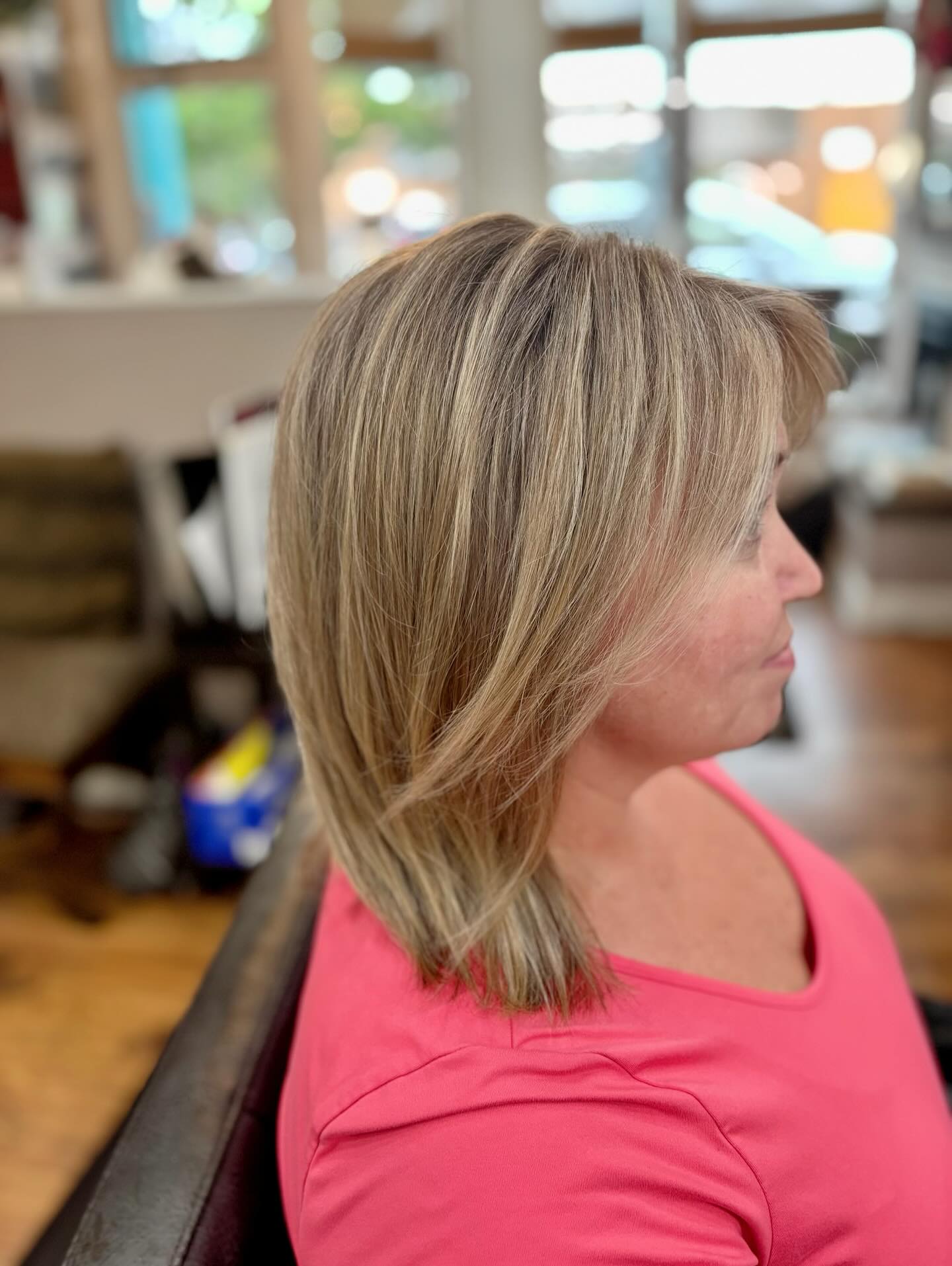 Soft Layered Blonde Cut with Subtle Face-Framing Highlights