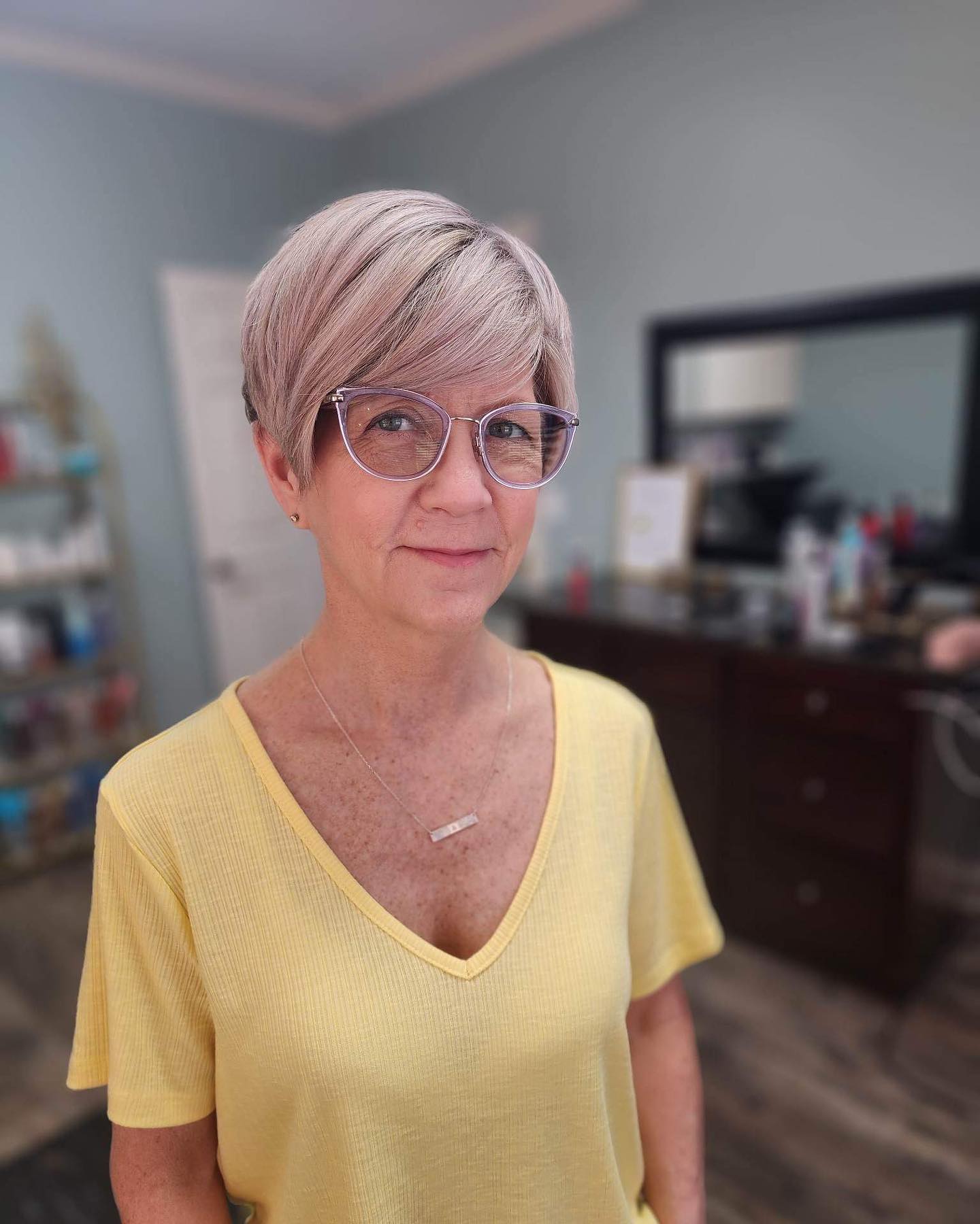 Softly Textured Side-Parted Pixie with Subtle Lavender Highlights