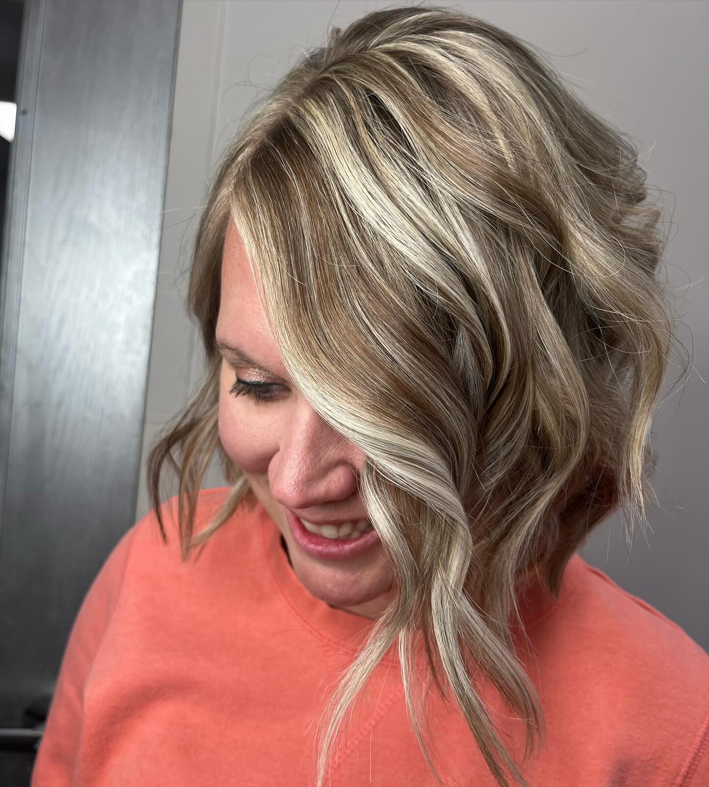 Textured Blonde Waves with Bright Dimension