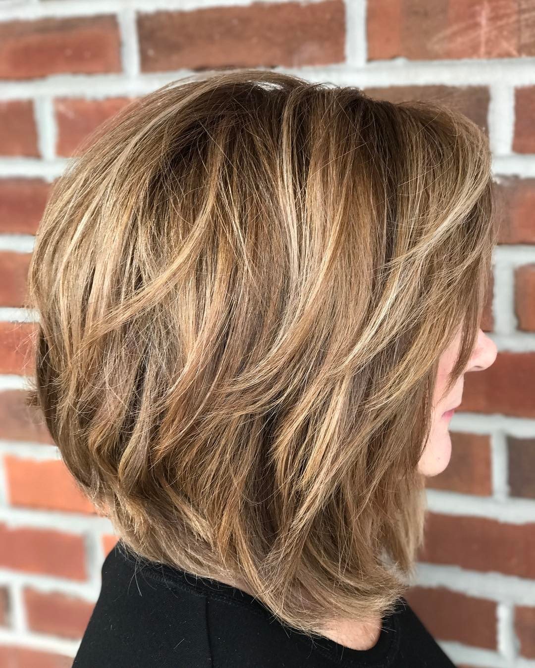 textured layered bob with subtle highlights