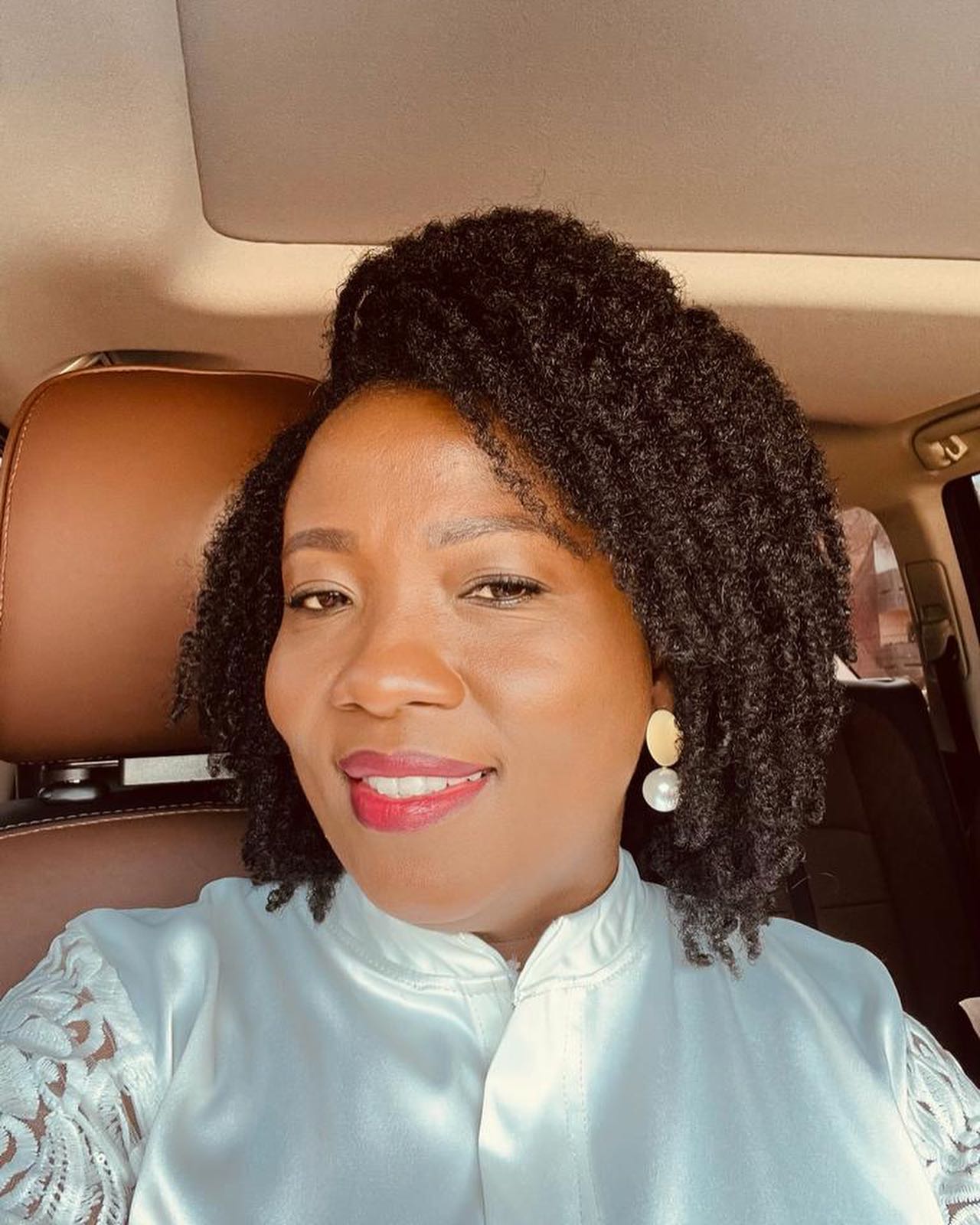 Textured Voluminous Curly Mid-Length Cut