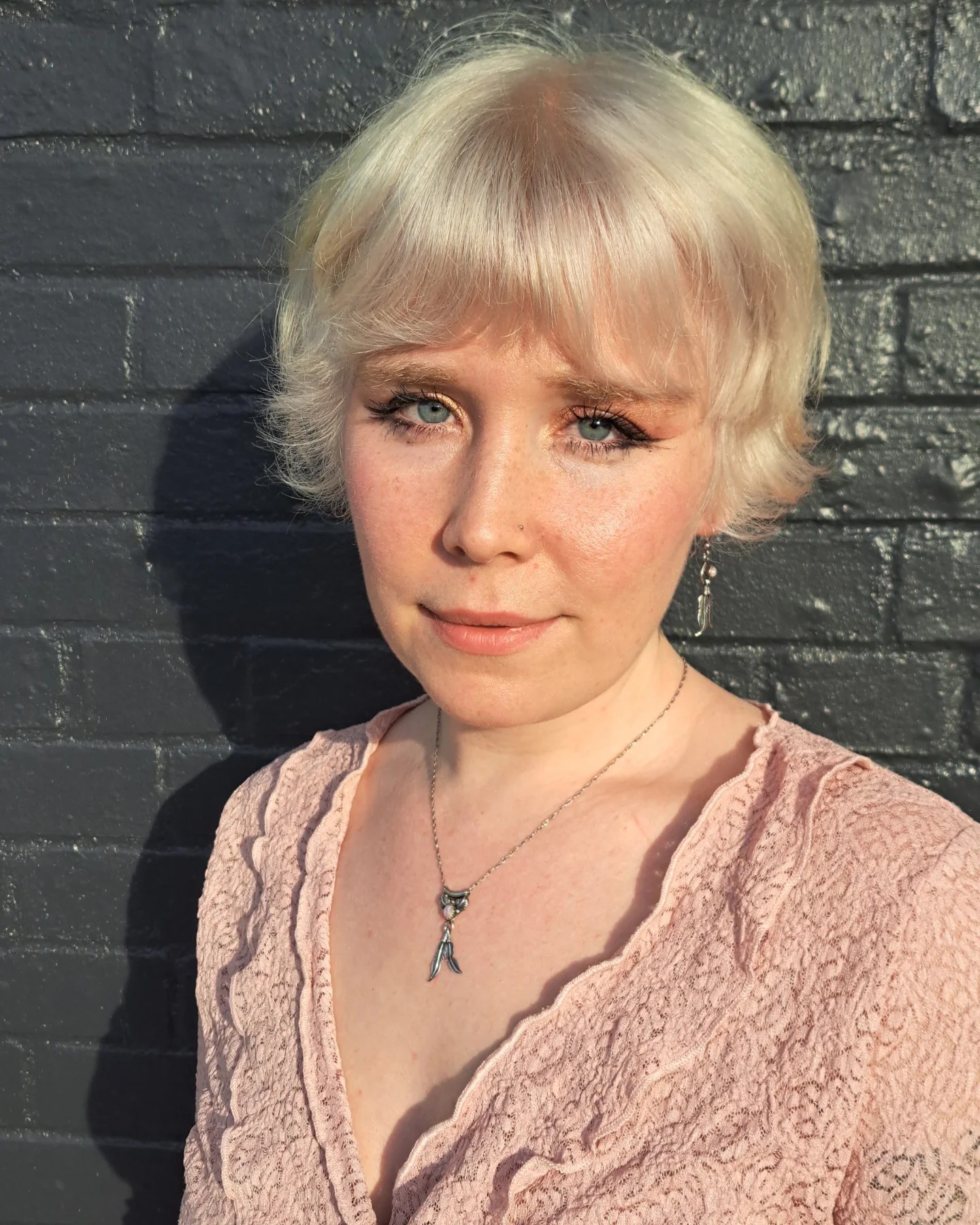 Charming Short Layered Cut with Soft Blonde Waves
