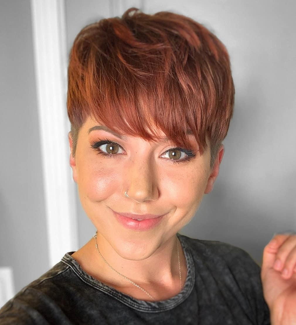 Chic Textured Copper Pixie Cut with Soft Fringe