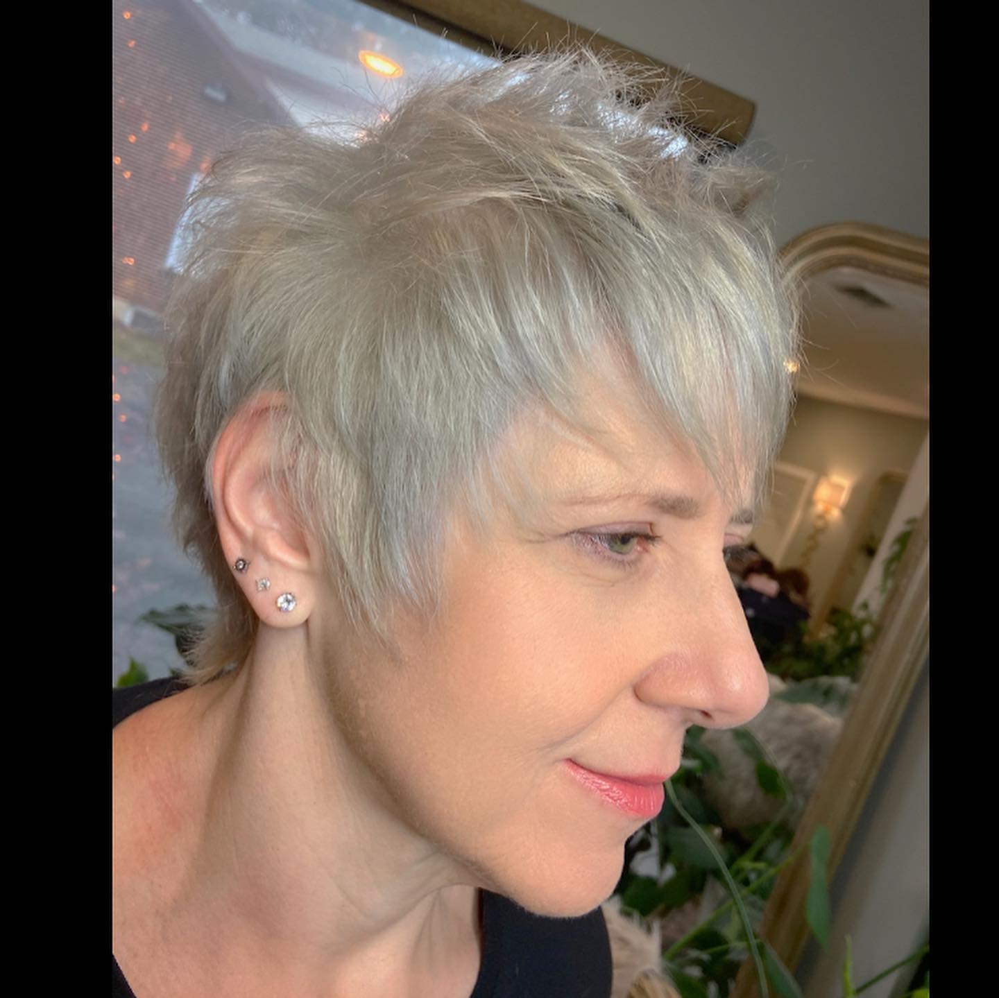 Chic Textured Short Pixie with Bold Silver Highlights
