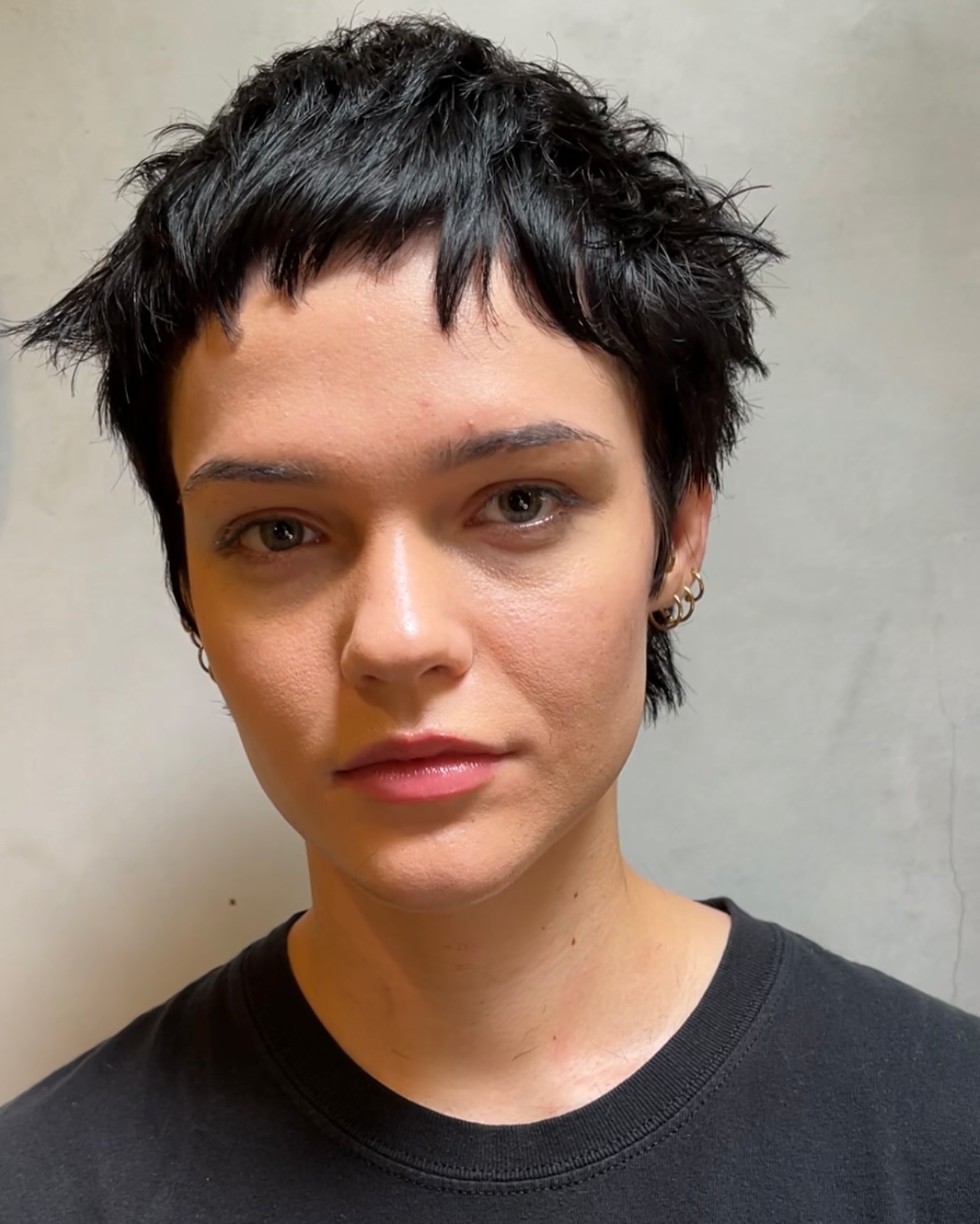 Edgy Textured Pixie Cut with Playful Fringes