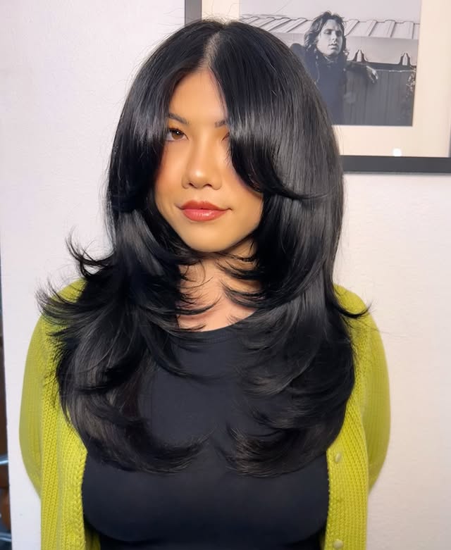 Elegant Voluminous Layered Cut with Face-Framing Layers