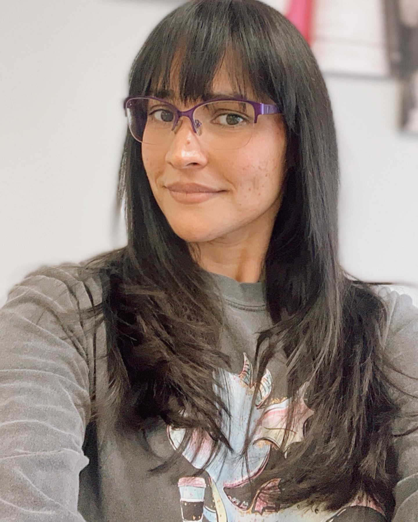 Sleek Long Layers with Soft Bangs