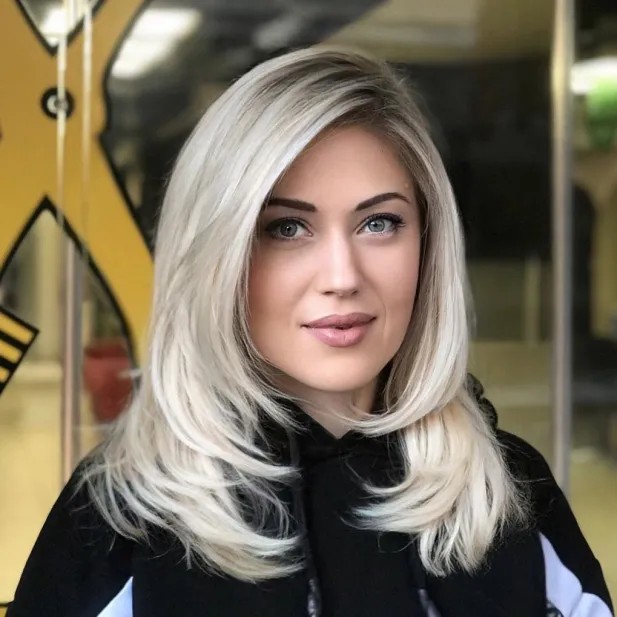 Softly Layered Blonde Cut with Subtle Face Framing
