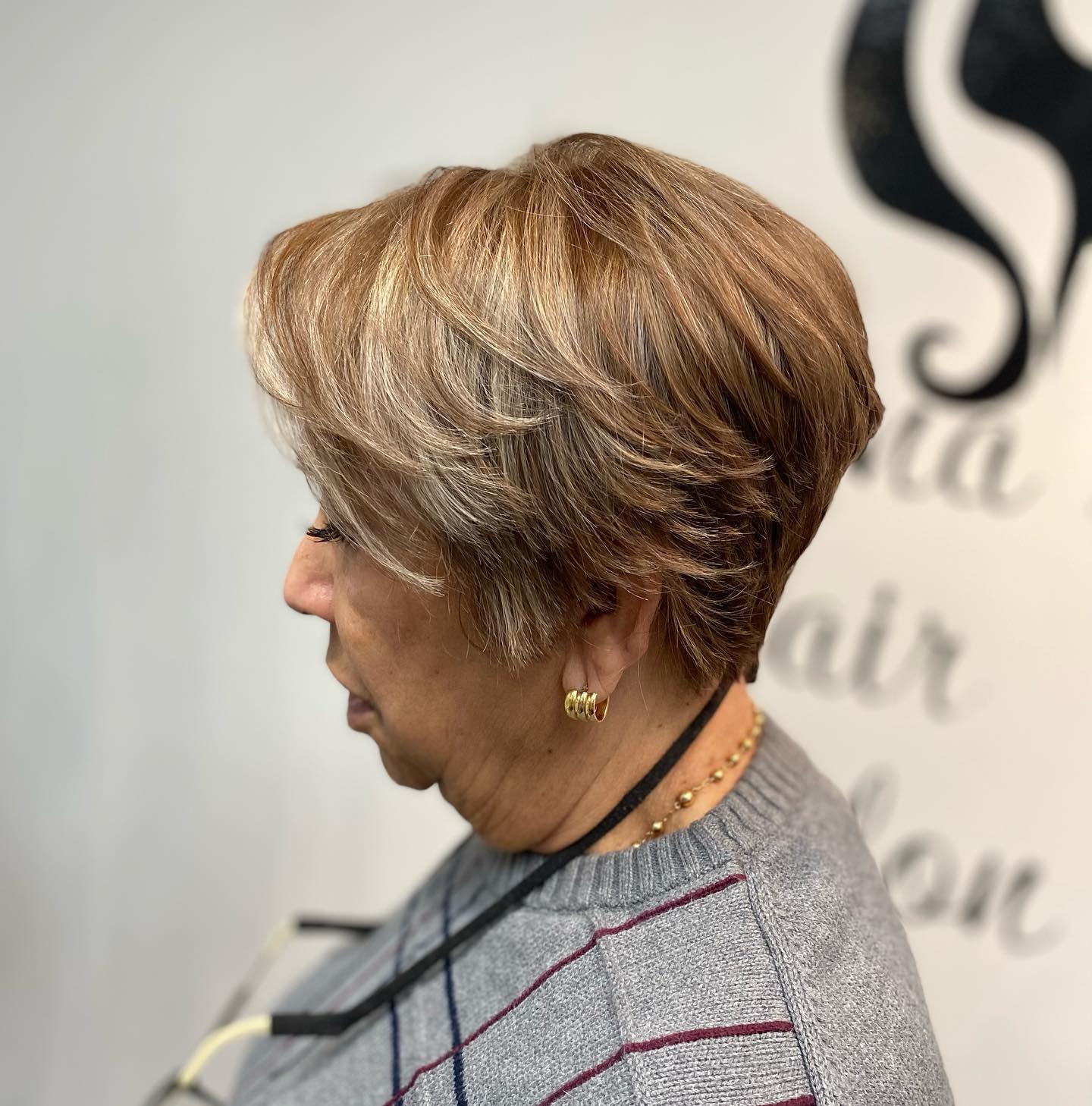 Softly Layered Caramel Pixie Cut