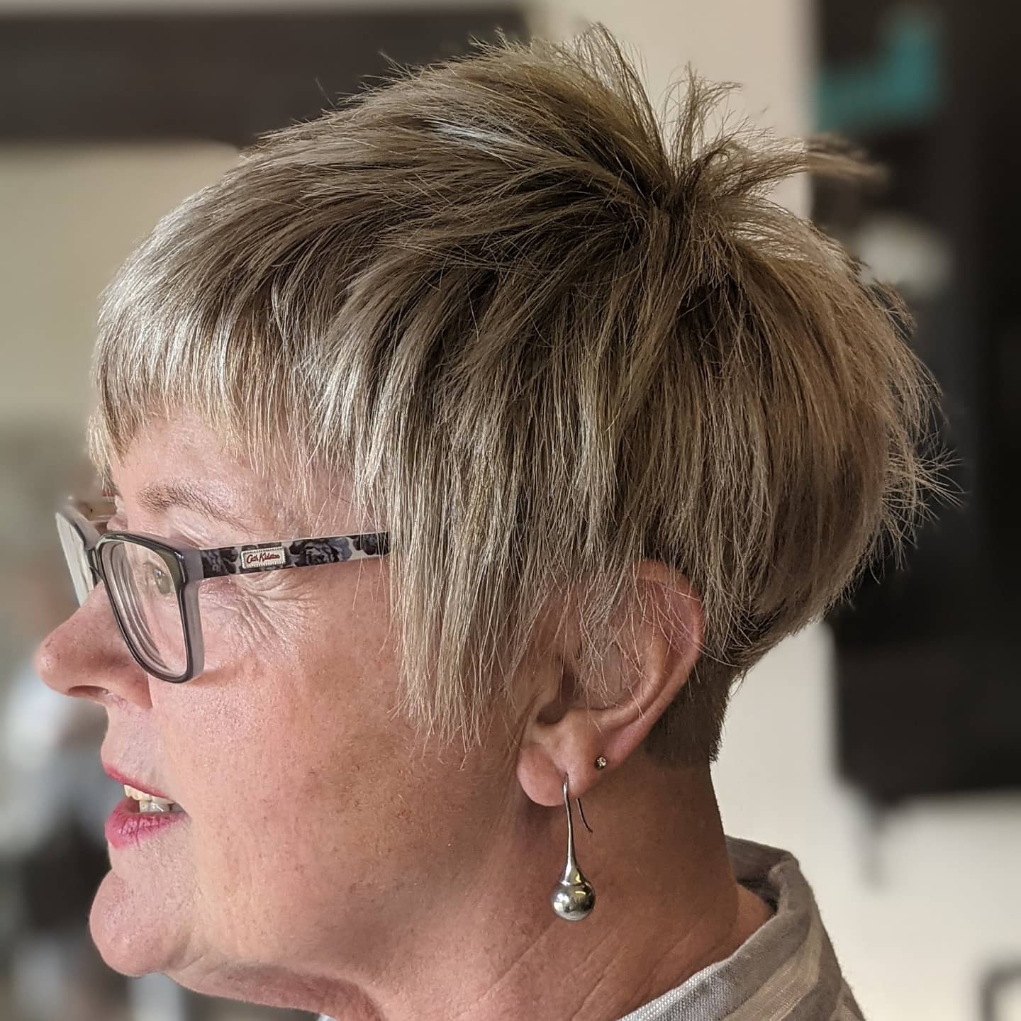 Textured Ash Blonde Pixie Cut with Playful Volume