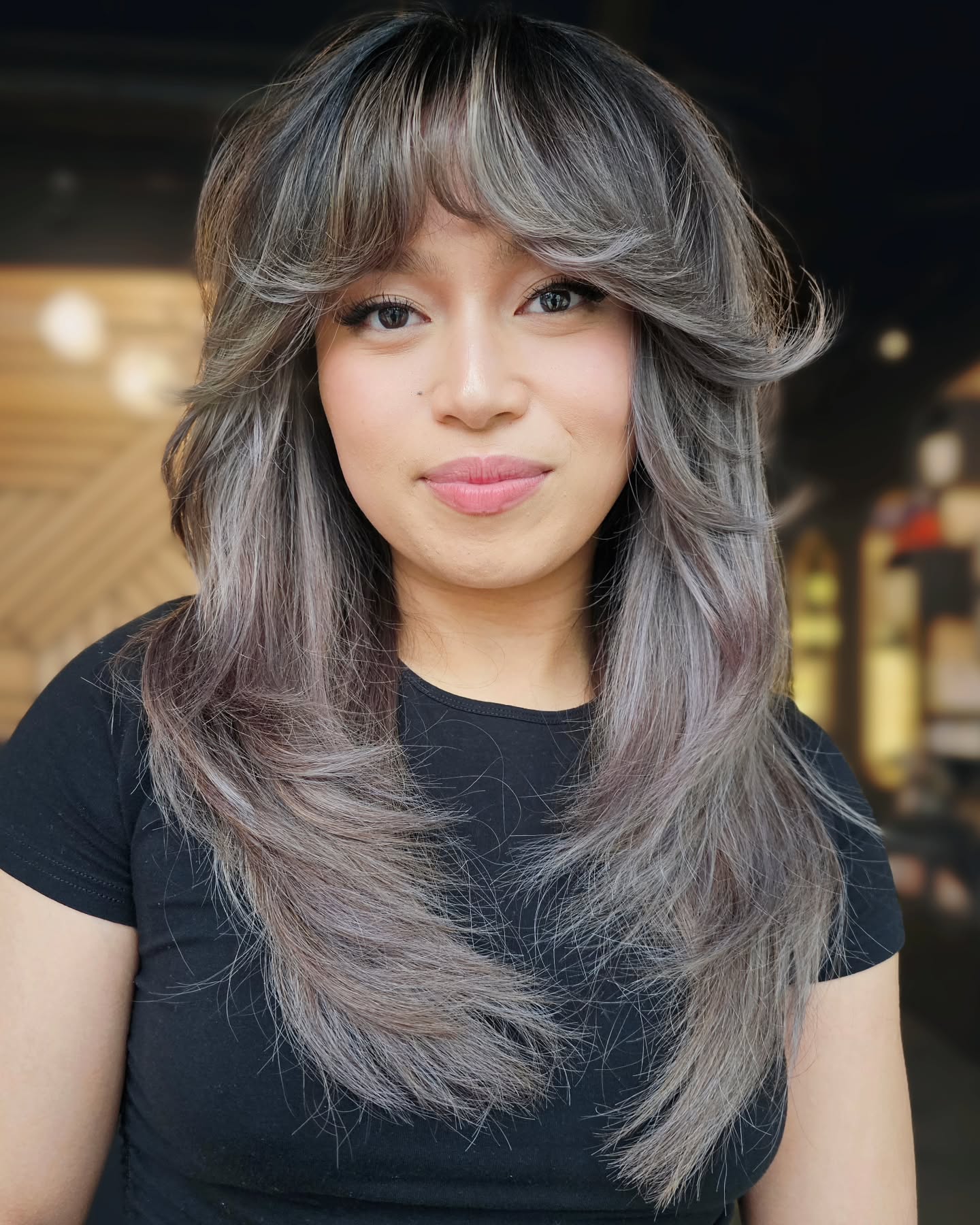 Textured Long Layers with Soft Bangs and Subtle Highlights