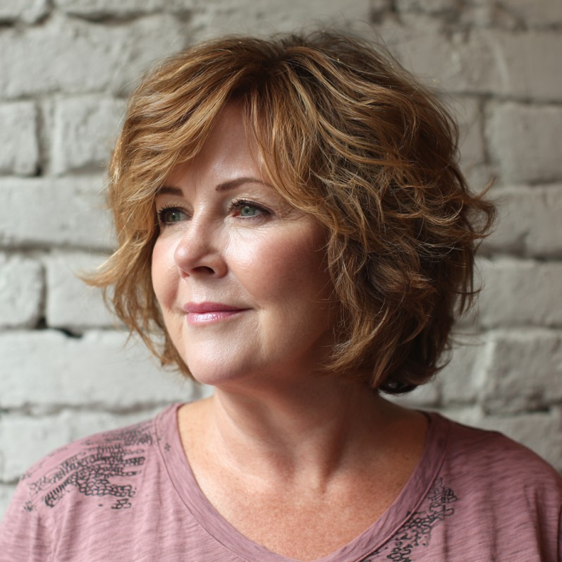 Textured Mid-Length Curly Cut with Soft Layers
