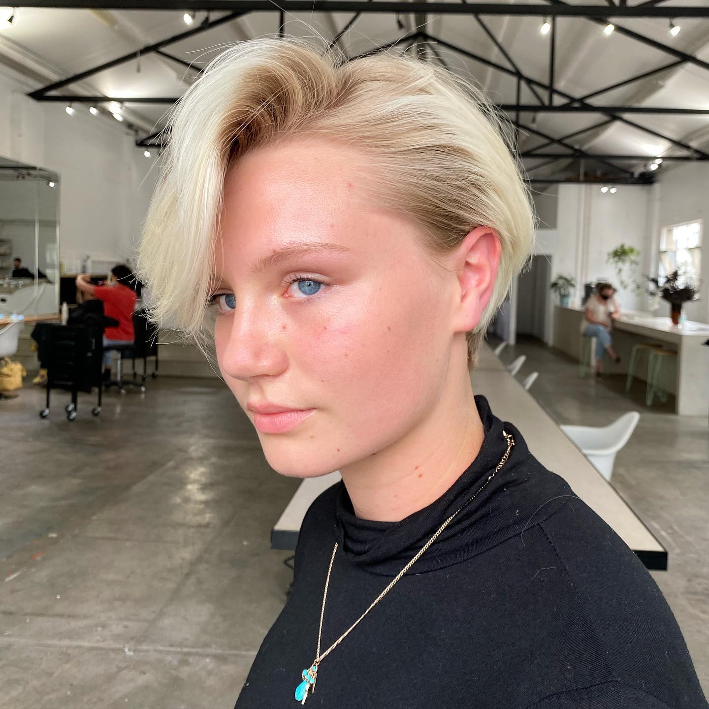 Textured Short Blonde Pixie with Side-Swept Bangs