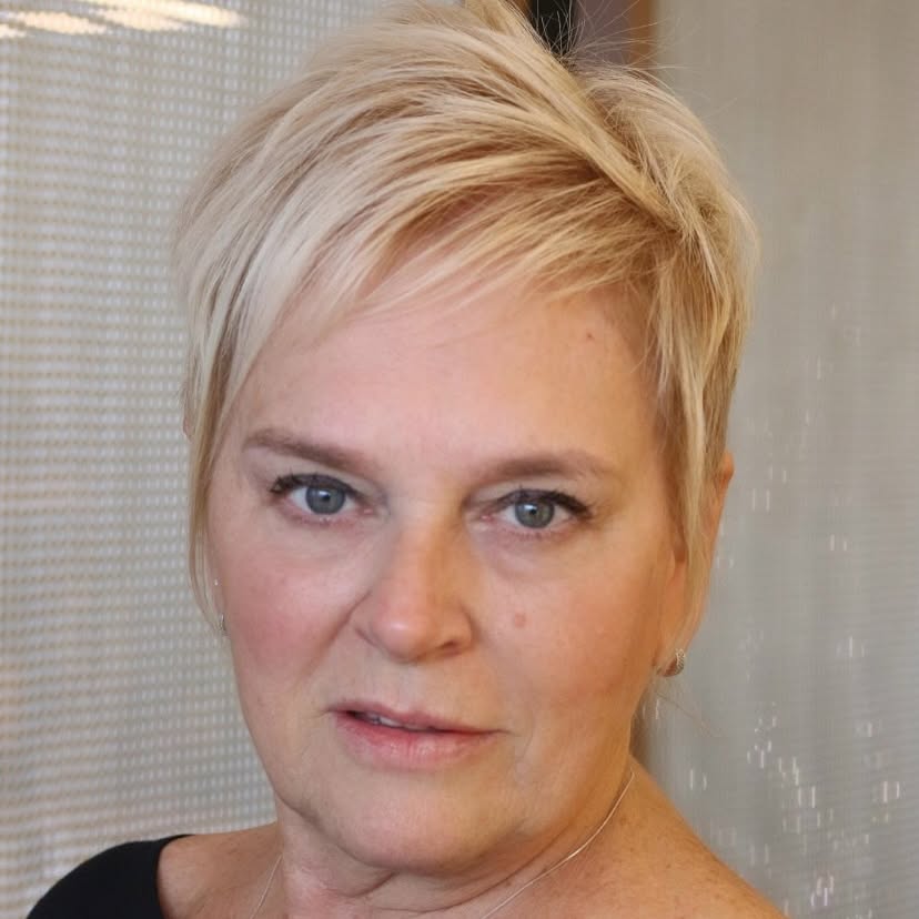Textured Short Pixie Cut with Subtle Highlights