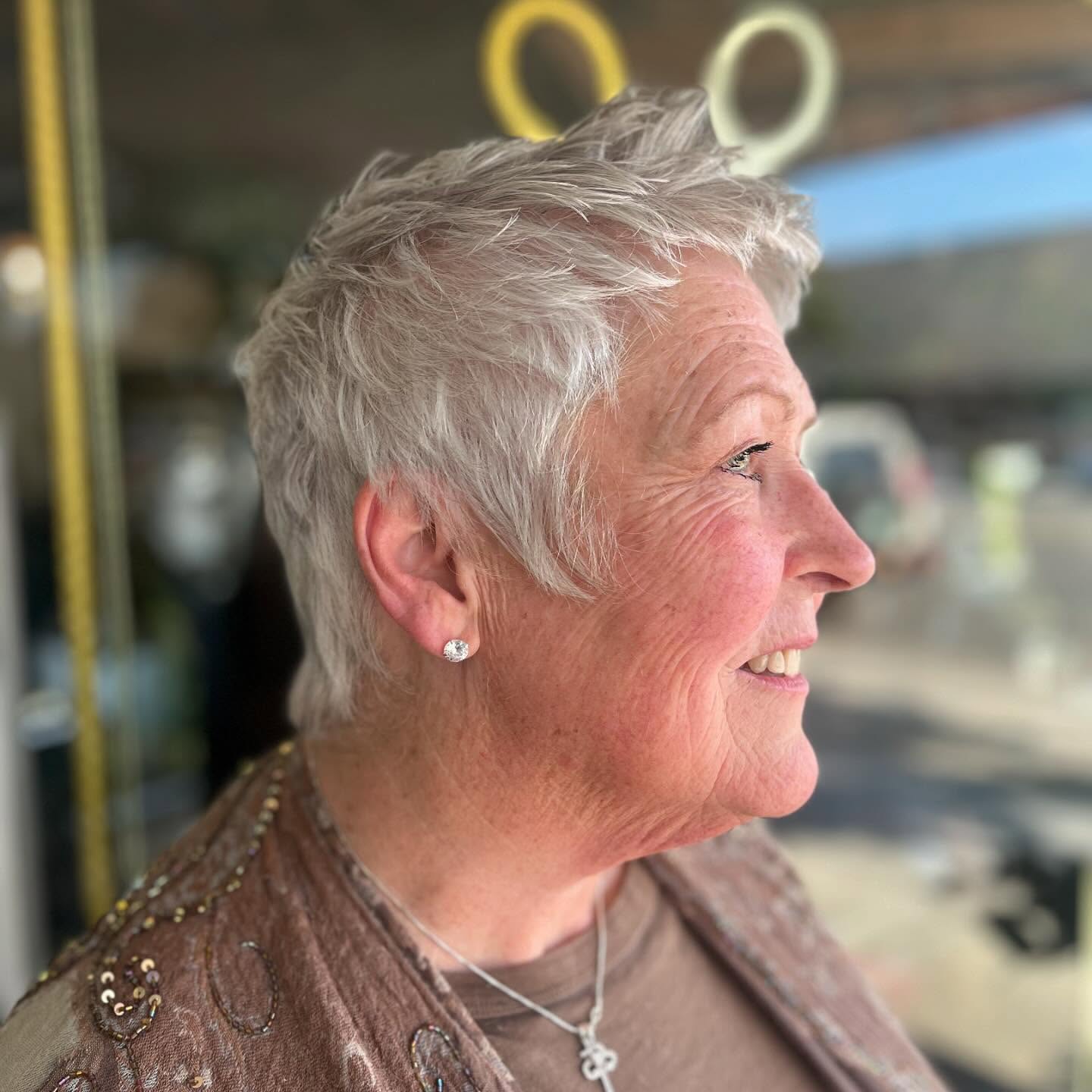 Textured Silver Pixie Cut with Feathered Volume