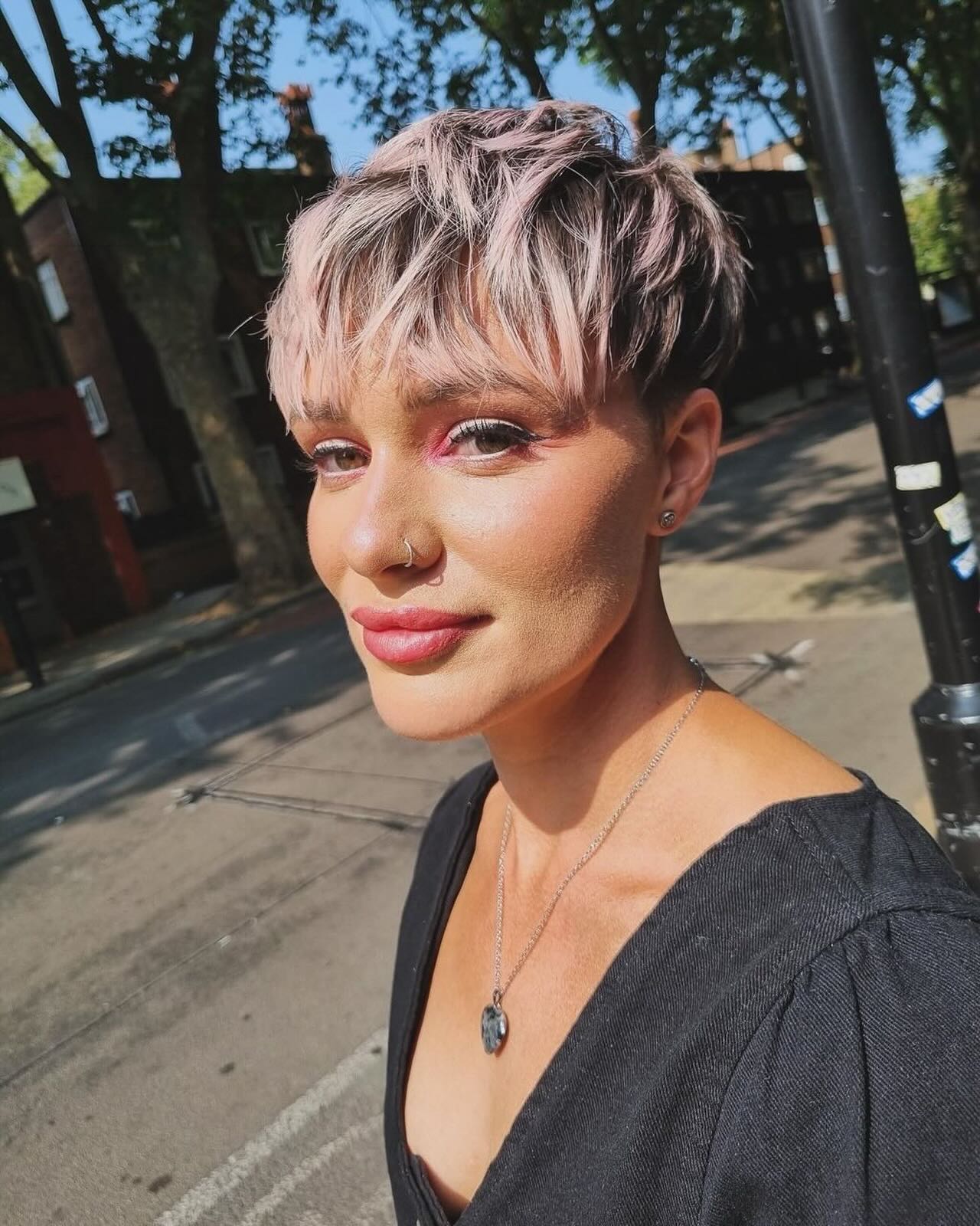 Trendy Textured Pixie with Subtle Rose Highlights