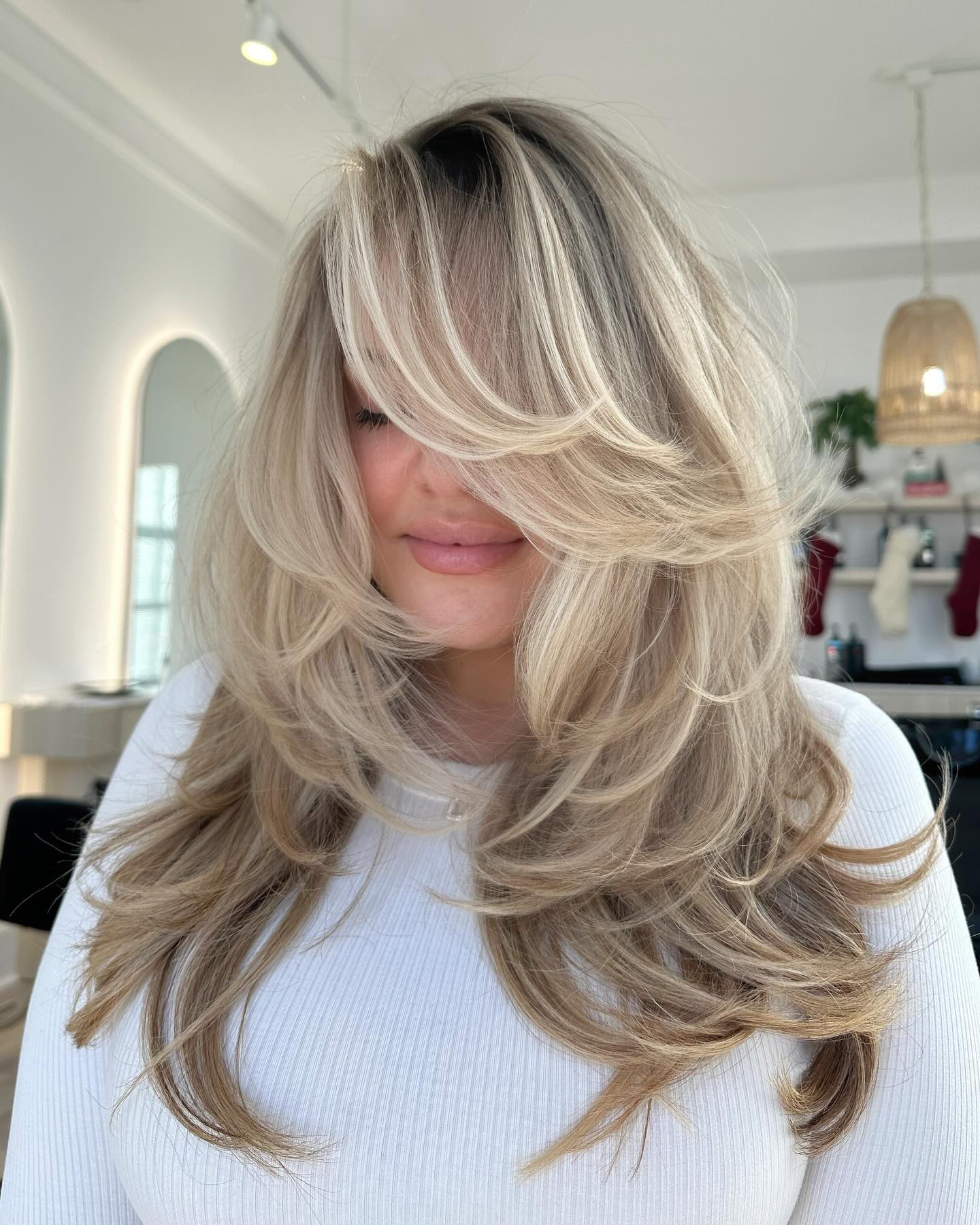 Voluminous Long Layered Cut with Soft Face Framing