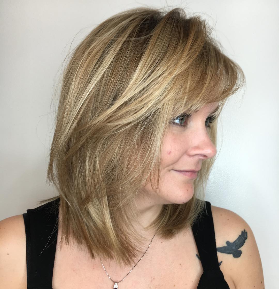 Natural Layered Shoulder-Length Bob with Subtle Face-Framing Bangs