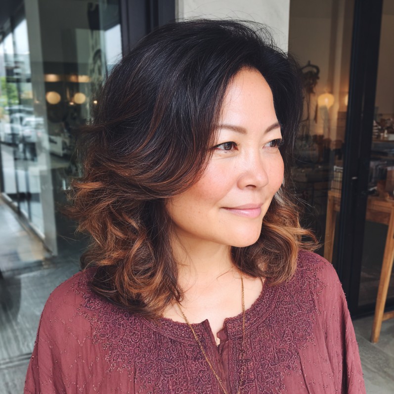 Textured Medium-Length Cut with Warm Balayage Highlights